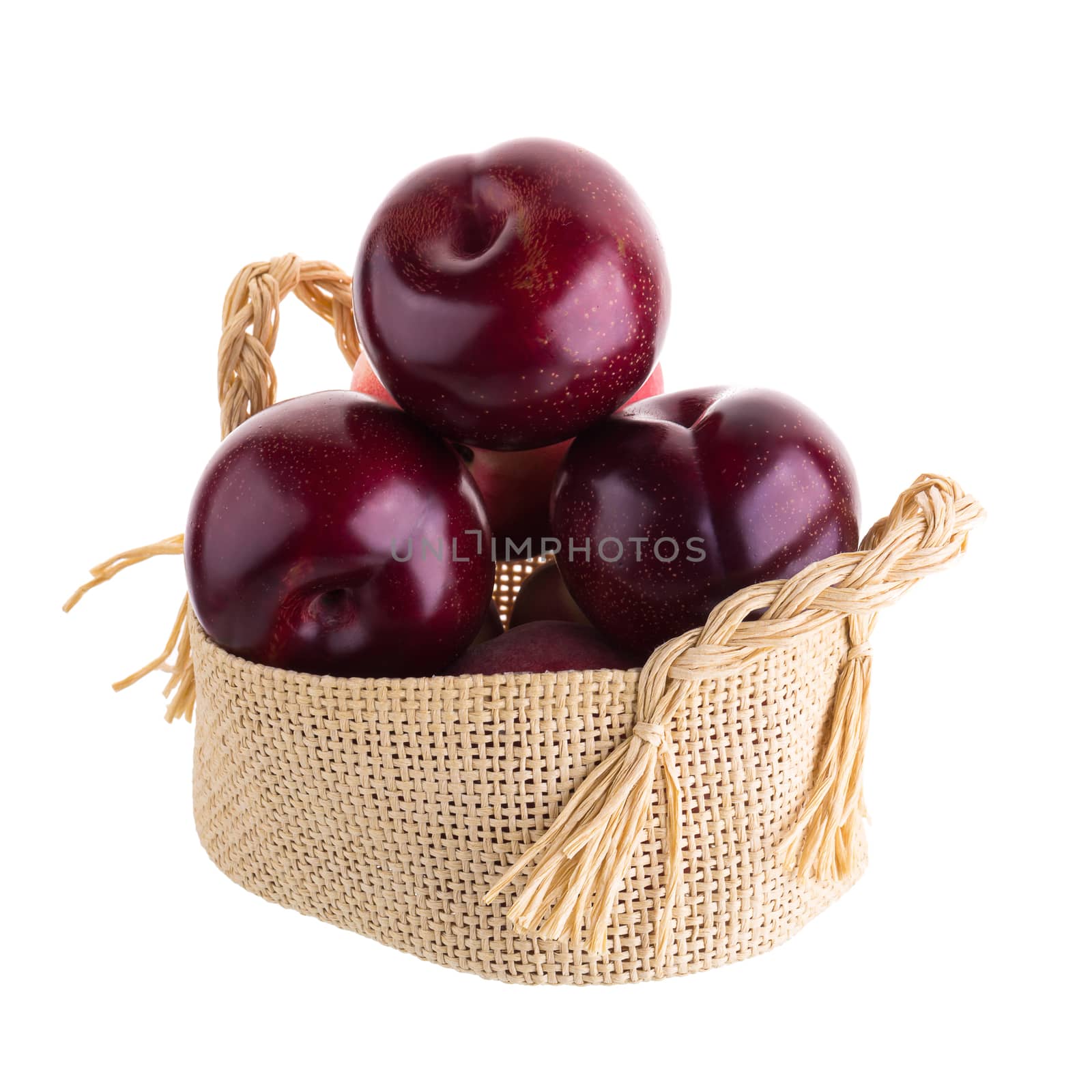 ripe fresh plum isolated on a white background.