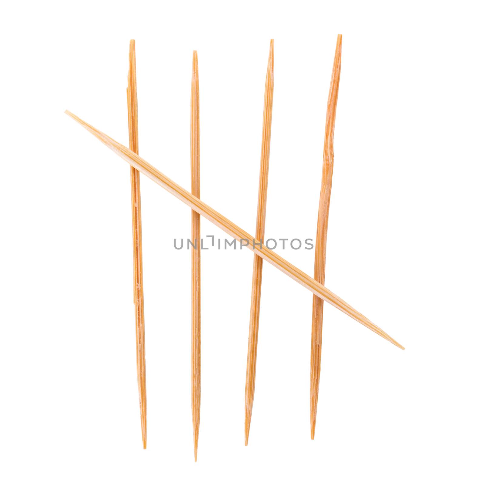 Toothpicks isolated on white. and Old roman antique alphabet number Top view.