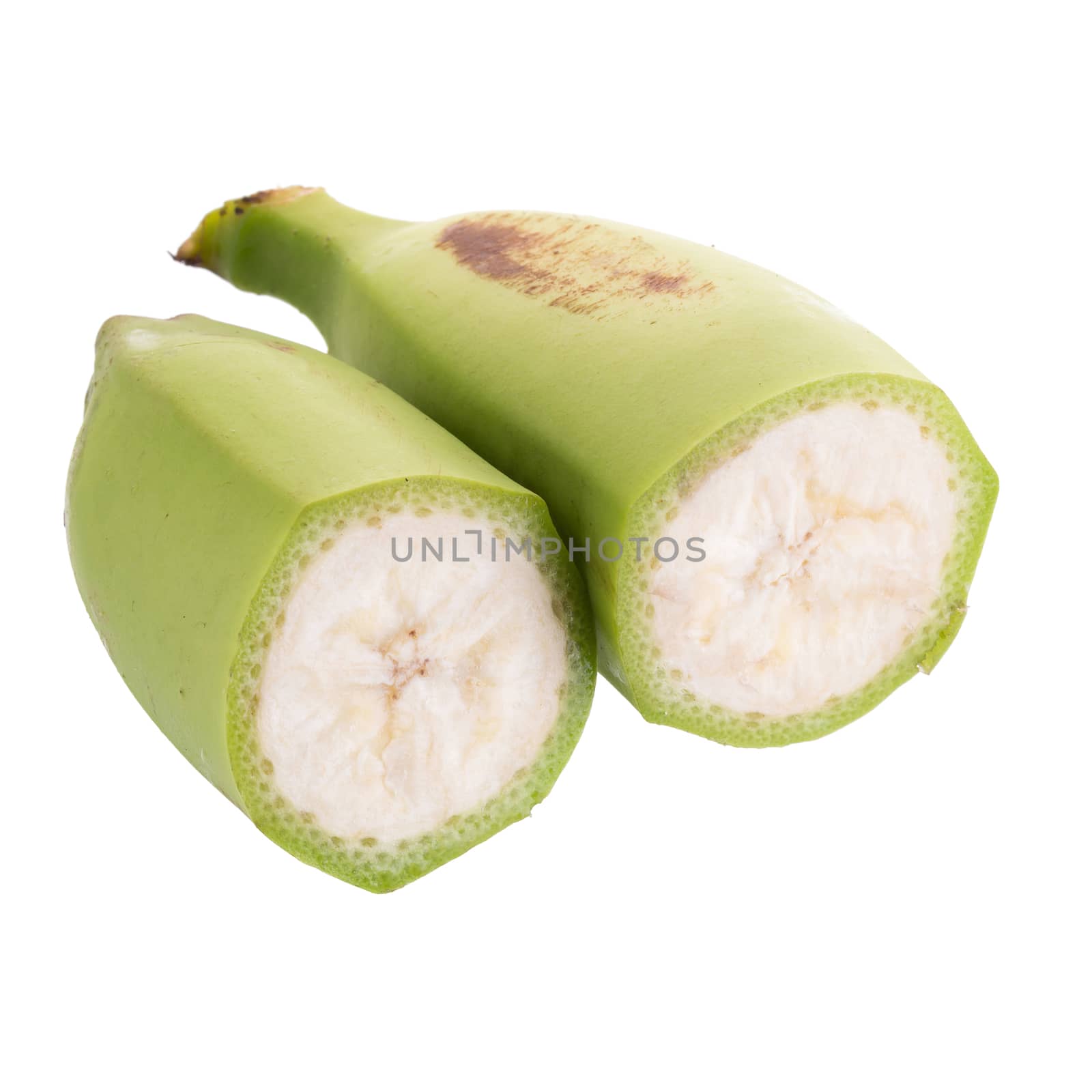 Cut of green bananas isolated on white background