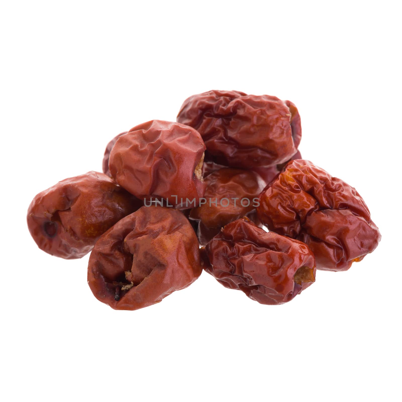 Dried jujube fruits chinese herbal medicine on a white background.