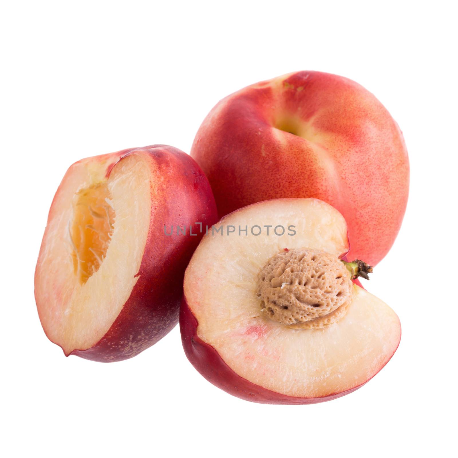 ripe fresh Nectarine fruit  with half and slice isolated on white background.