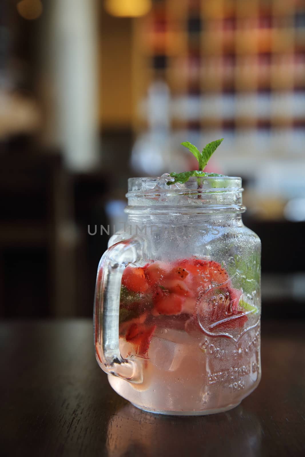 strawberry cocktail on wood background
