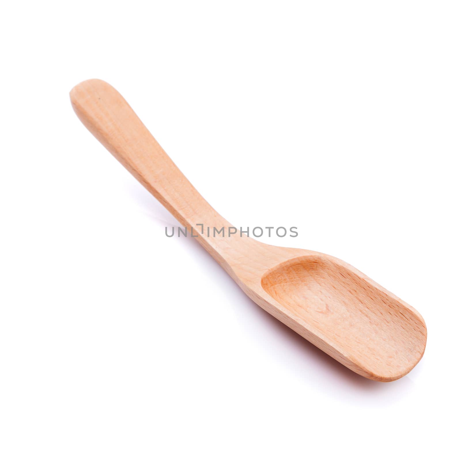 Wooden spoon on a white background.