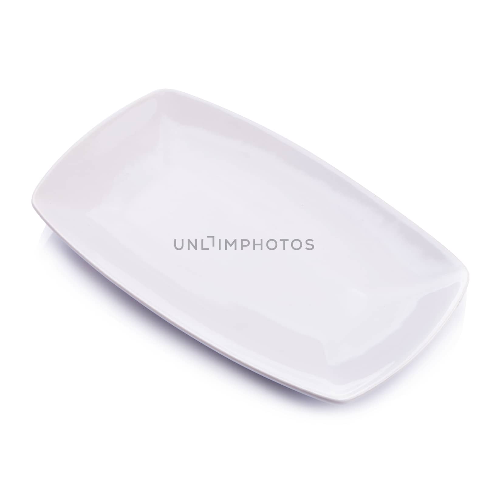 Ceramic white plate on a white background by kaiskynet