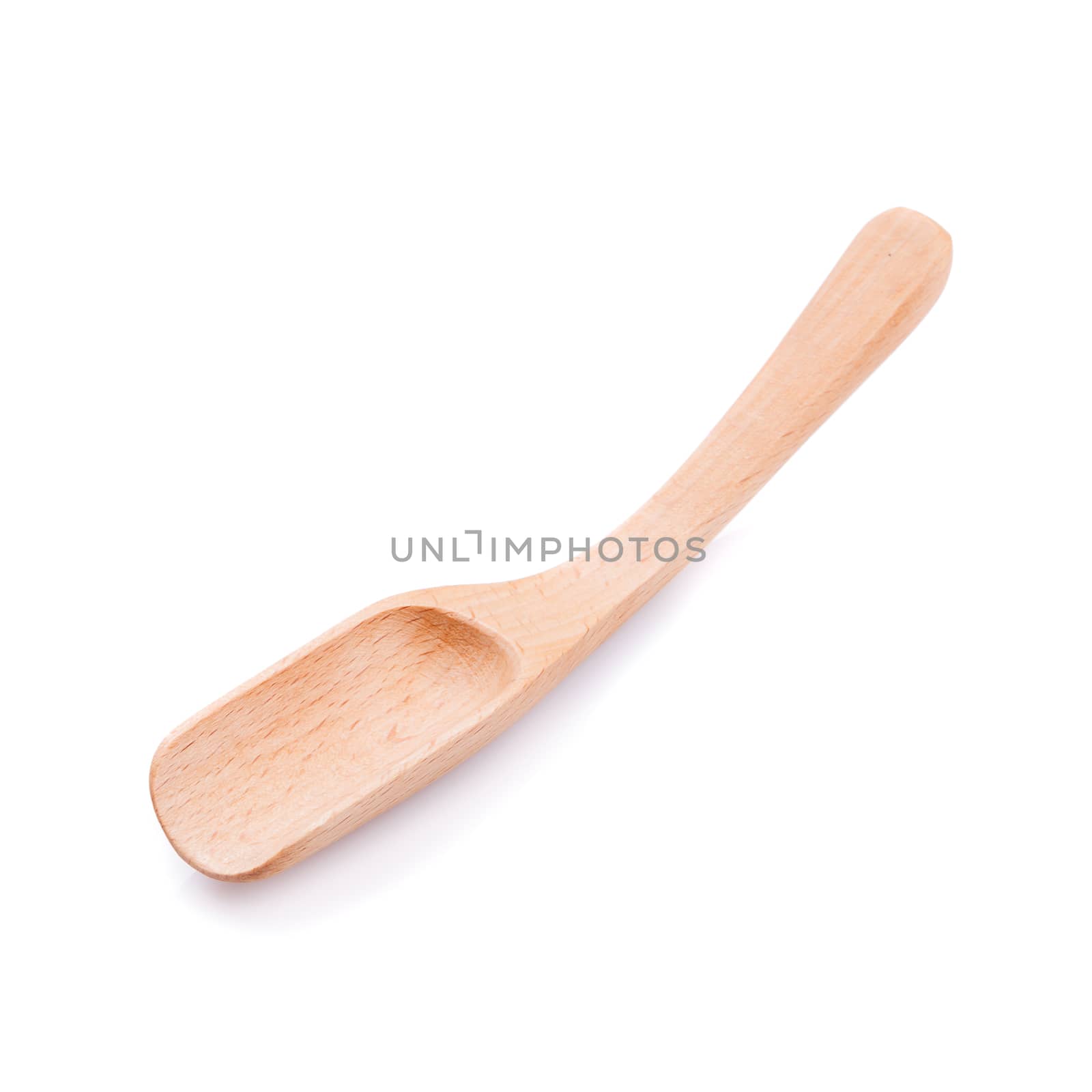 Wooden spoon on a white background.