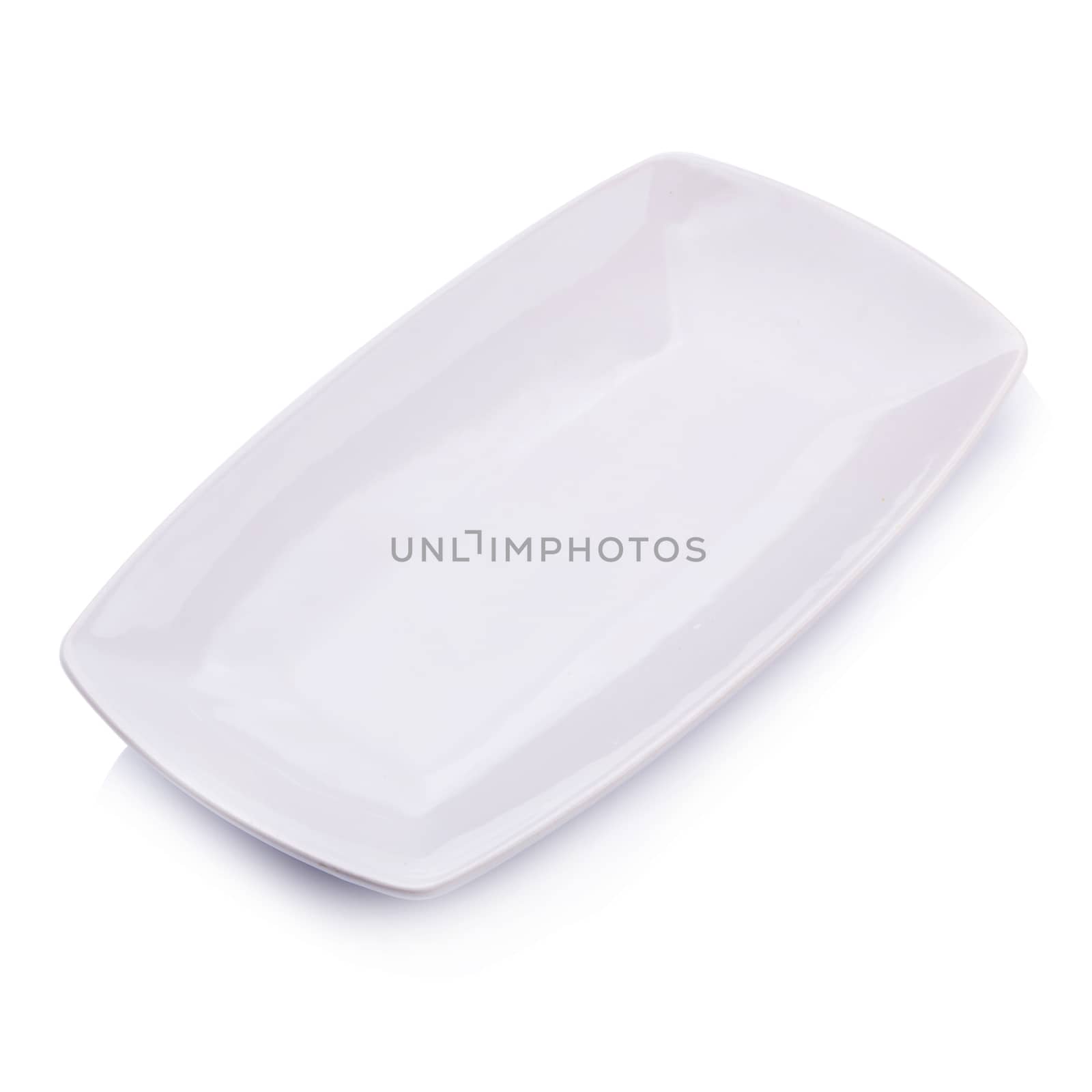 Ceramic white plate on a white background.
