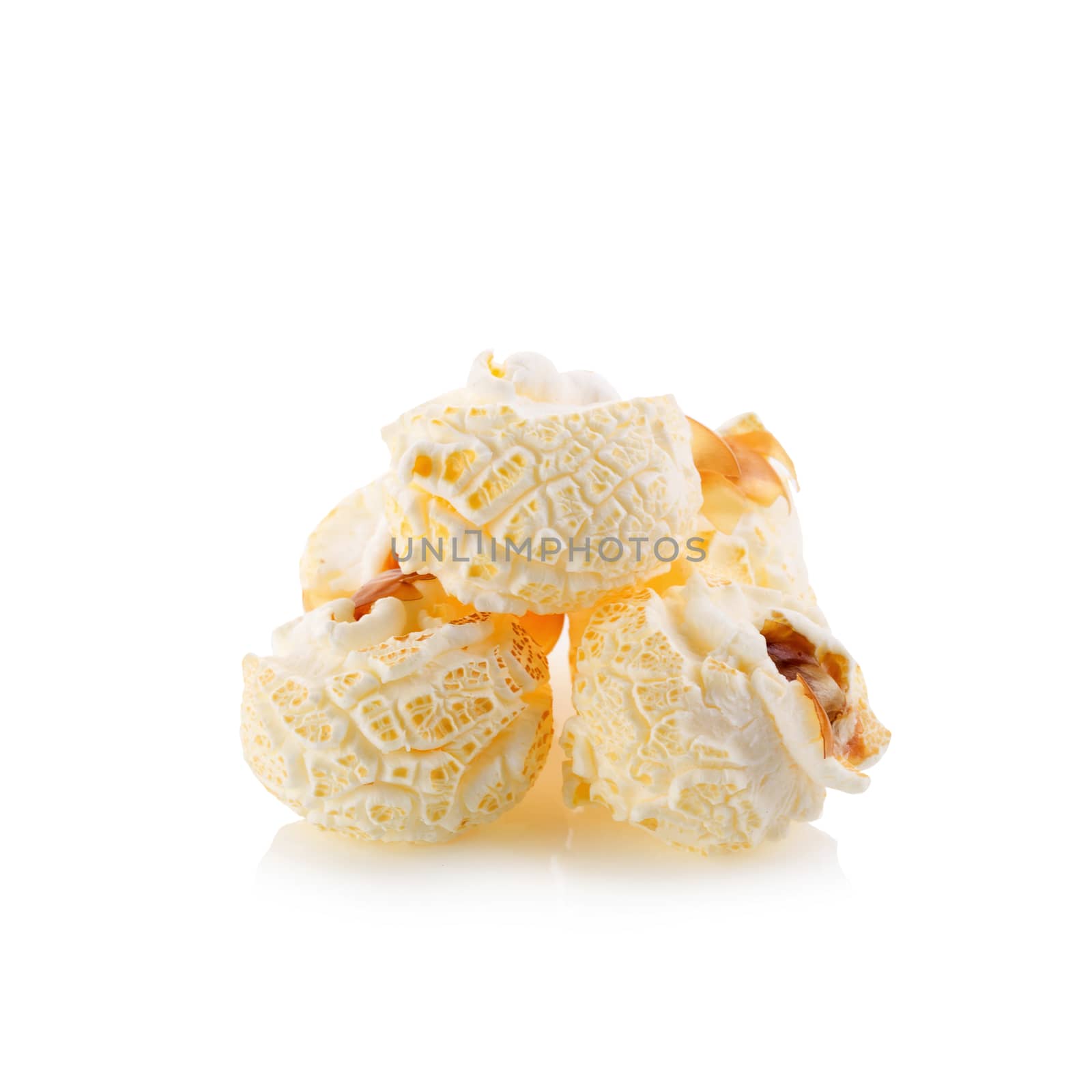 close-up popcorn isolated on a white background by kaiskynet