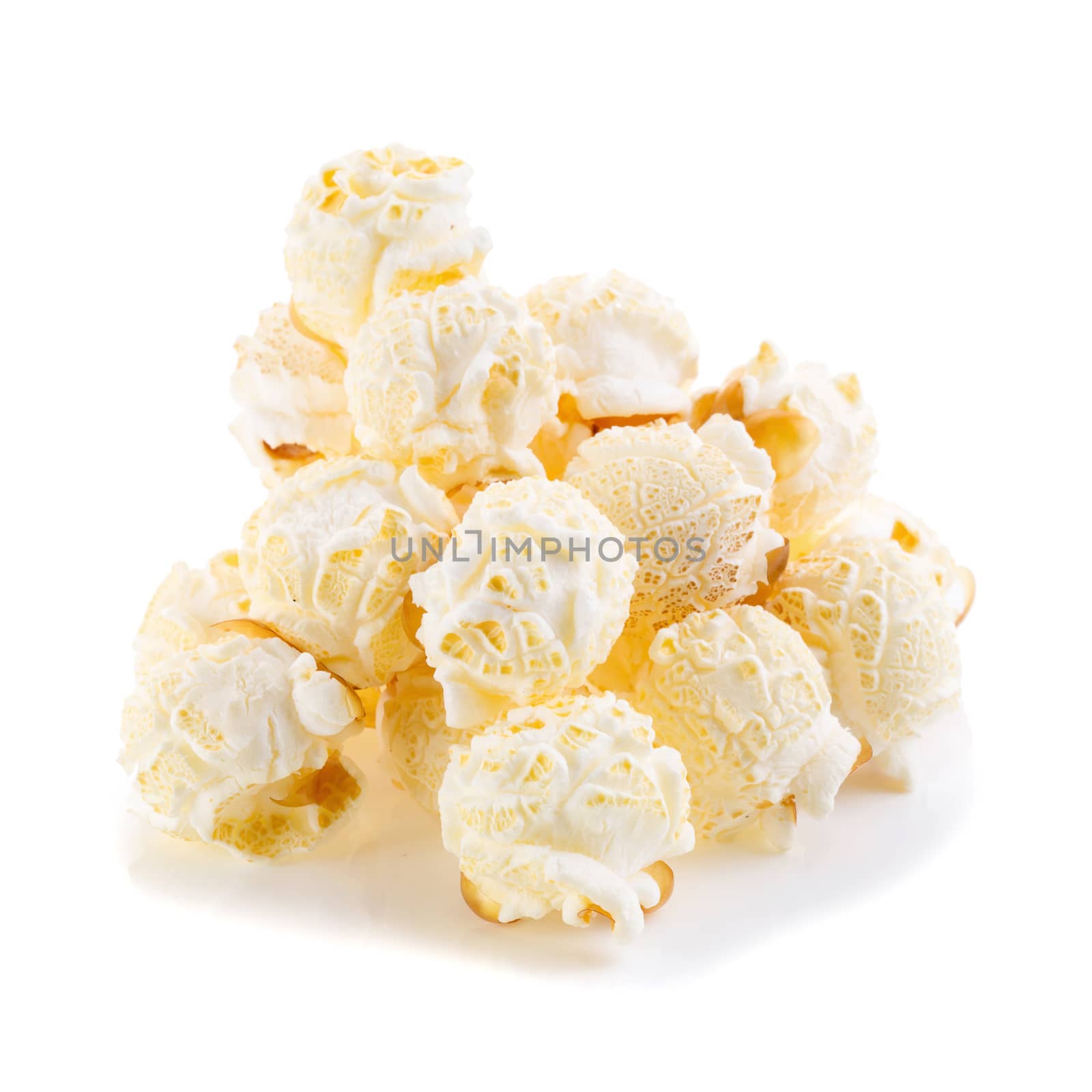 close-up popcorn isolated on a white background by kaiskynet