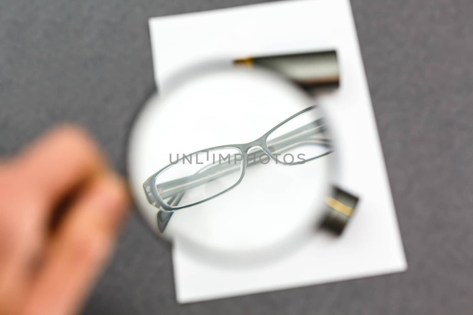 Glasses on paper with the engineer's office.