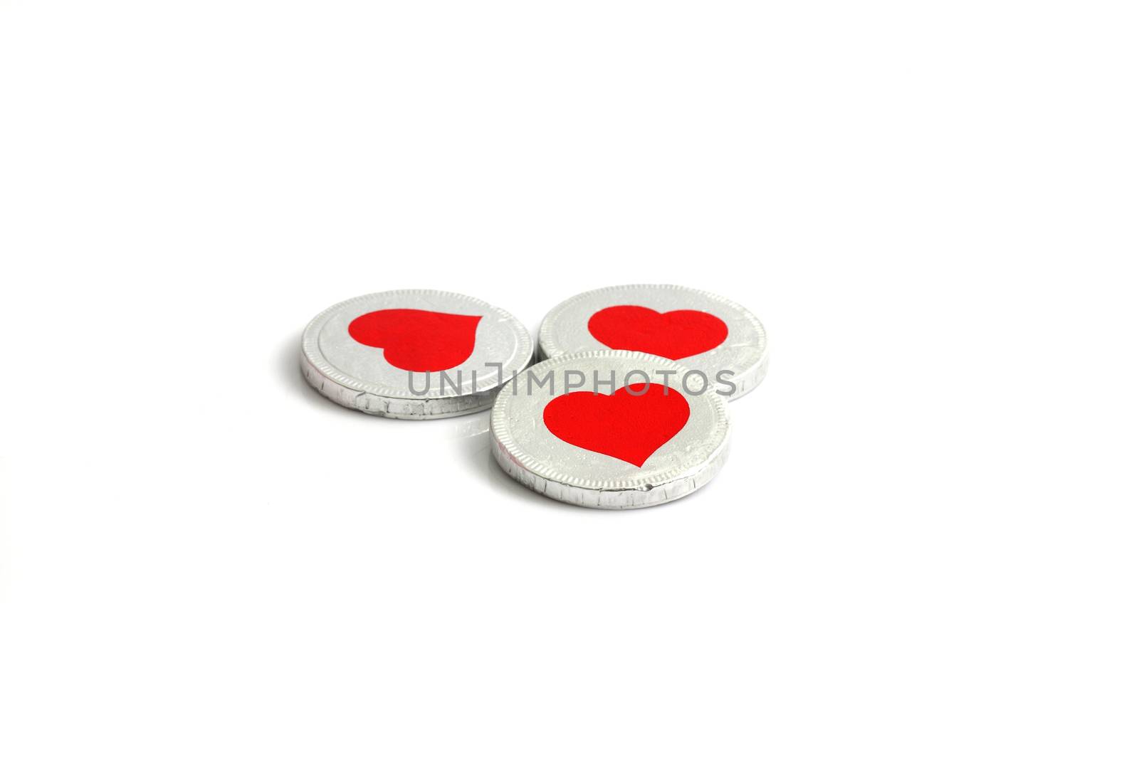 chocolate hearts candies isolated on white 
