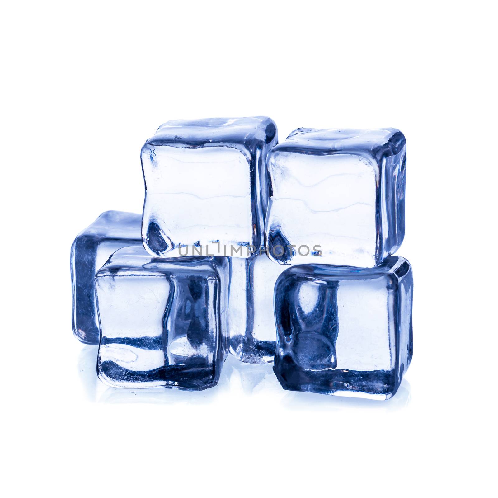Melting ice cubes isolated on white background. by kaiskynet