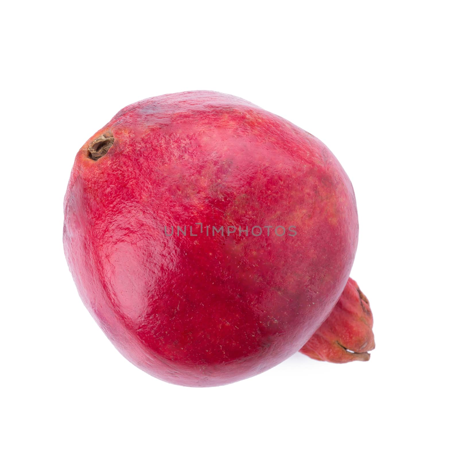 Ripe pomegranate fruit isolated on white background.