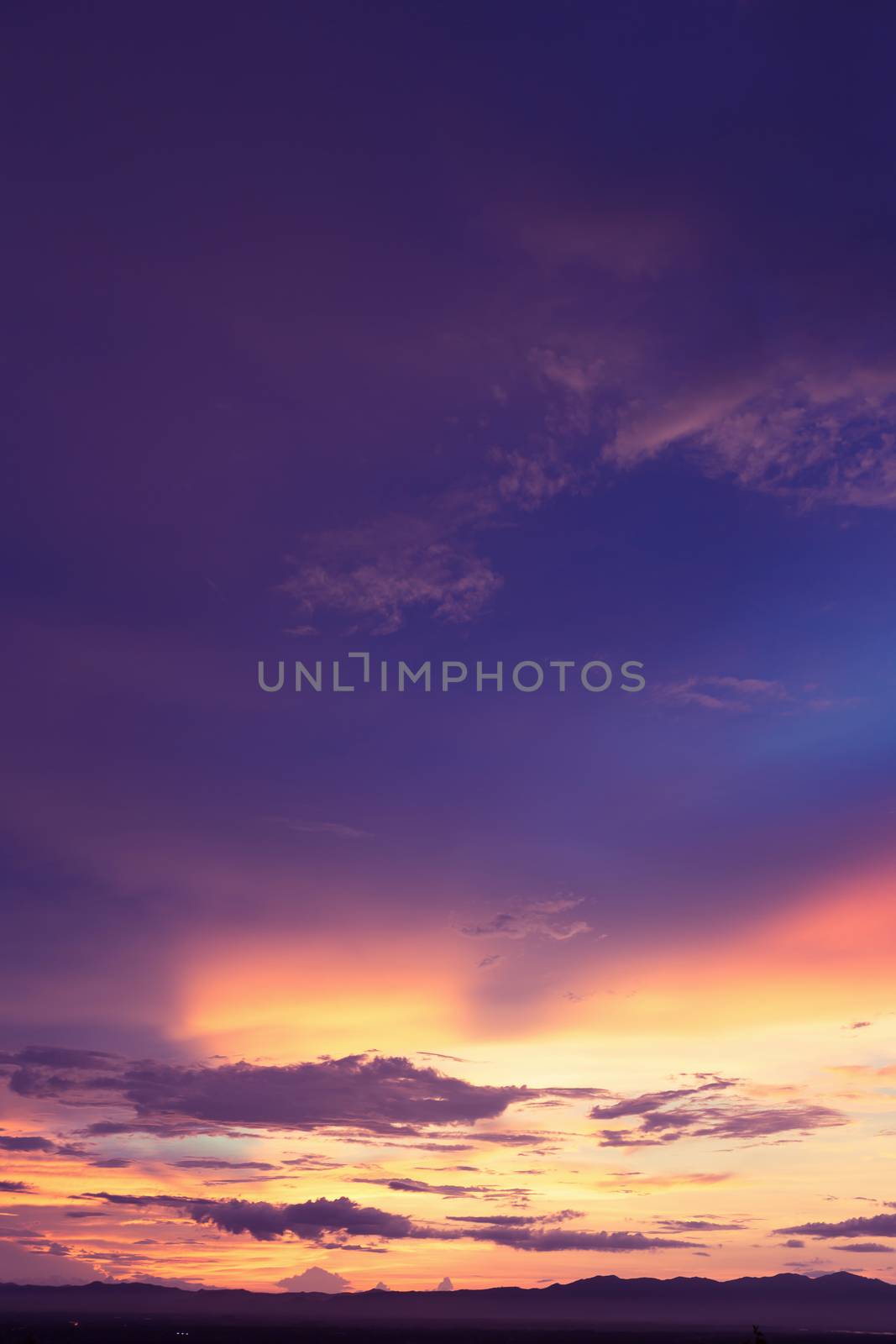 Colorful dramatic sky with cloud at sunset.Sky with sun backgrou by kaiskynet