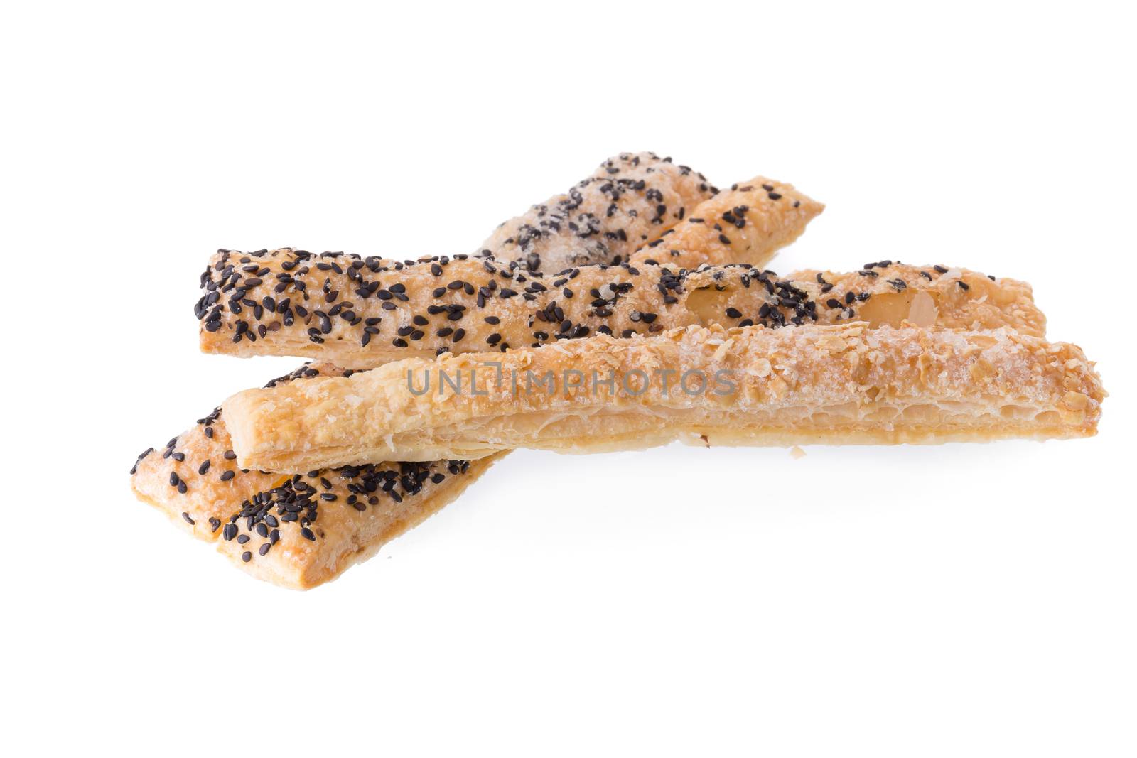 Crispy sesame pie isolated on white background.