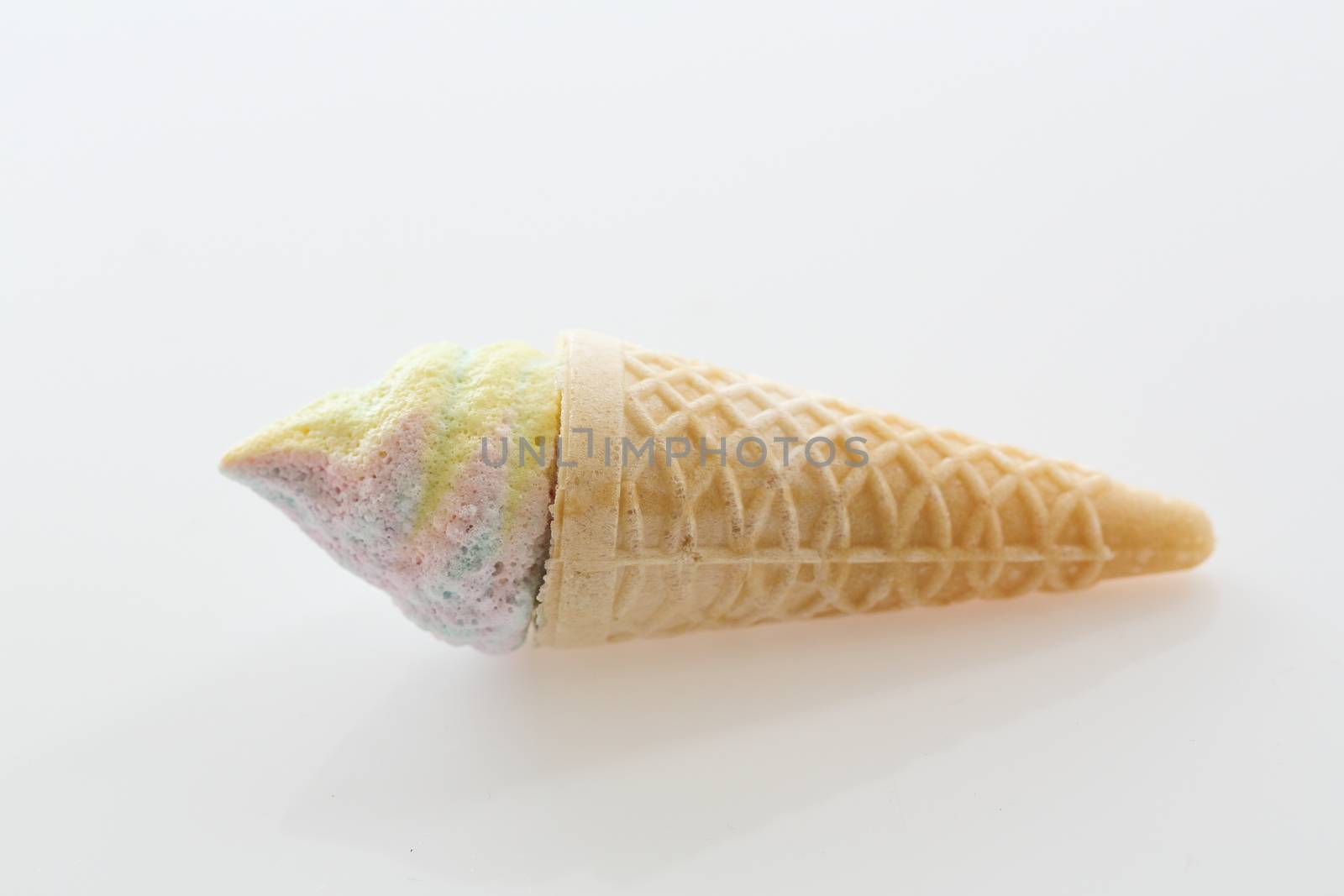 Mini ice cream cone candy isolated in white background