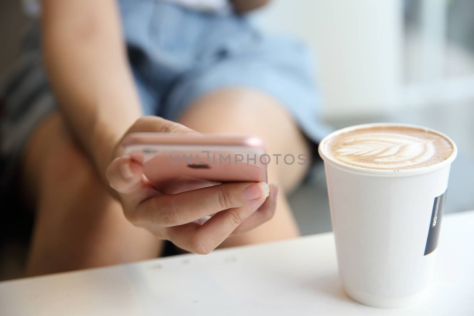 business trading online on smartphone with woman hand by piyato