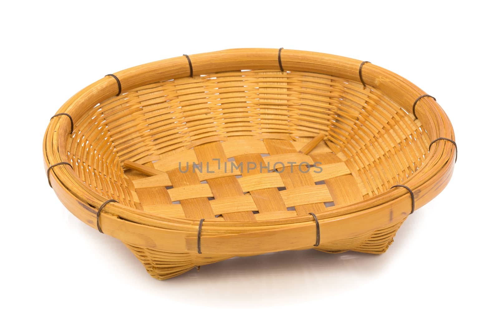 Wicker dish isolated on a white background.