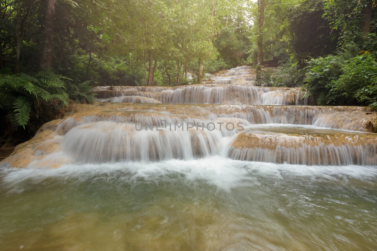 Deep forest waterfall National Park in Ngao District Lampang Thailand.