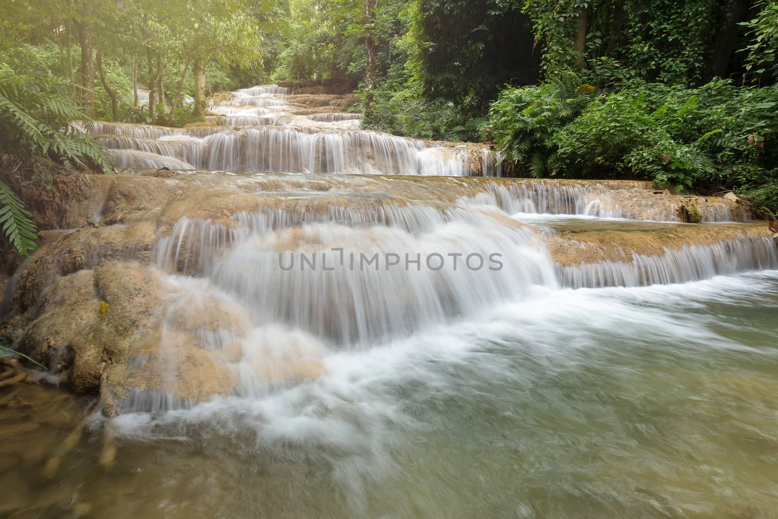 Deep forest waterfall National Park in Ngao District Lampang Thailand.