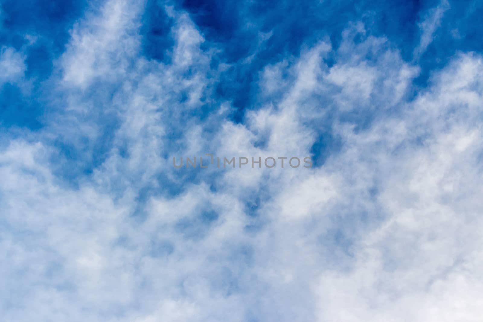 Colorful dramatic sky with cloud at sunset.Sky with sun background.