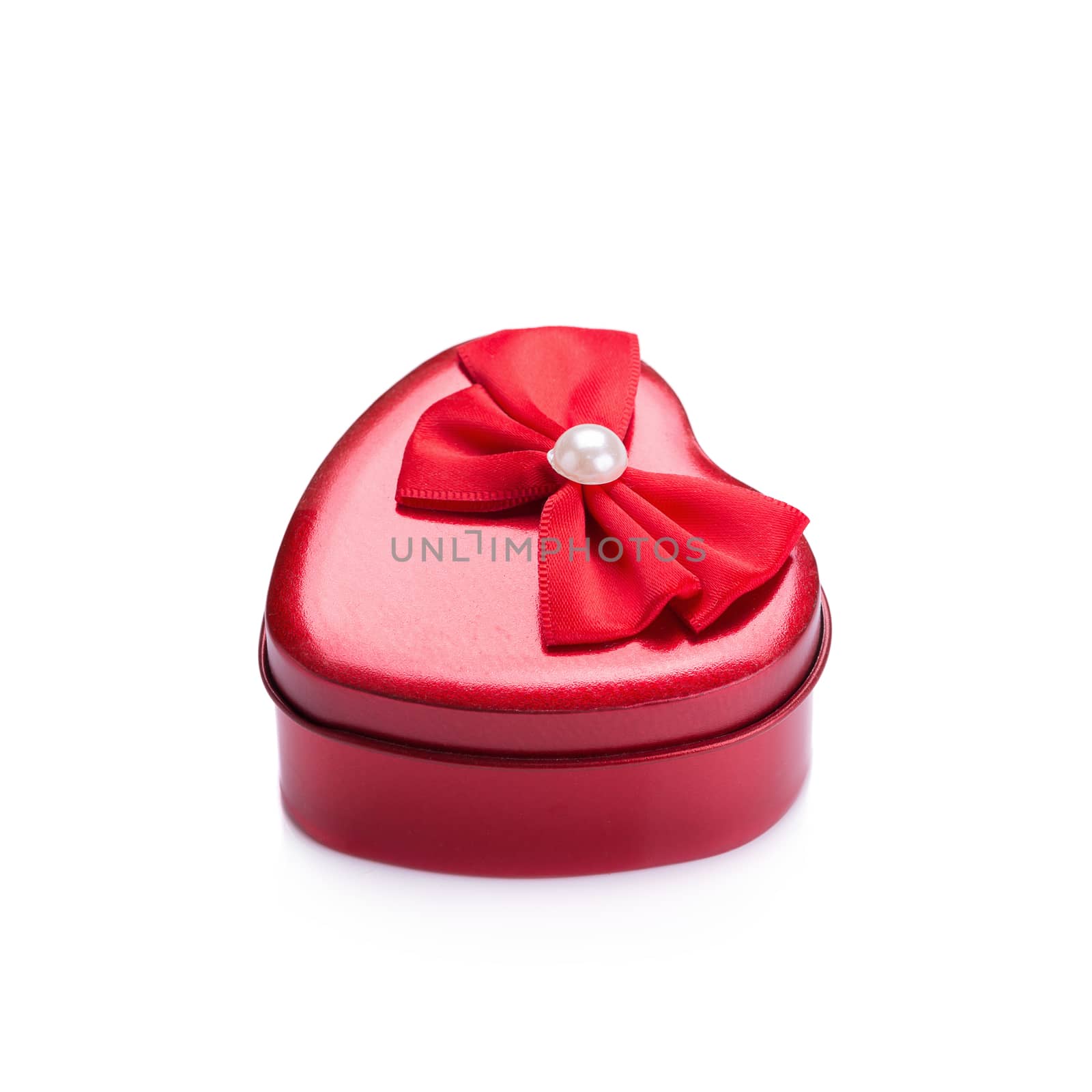 Red heart metal box on white background by kaiskynet