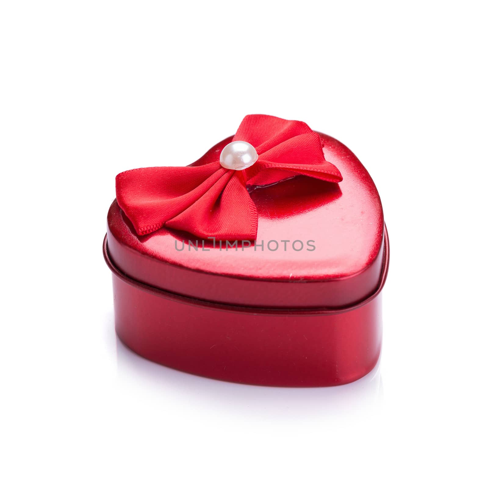 Red heart metal box on white background by kaiskynet