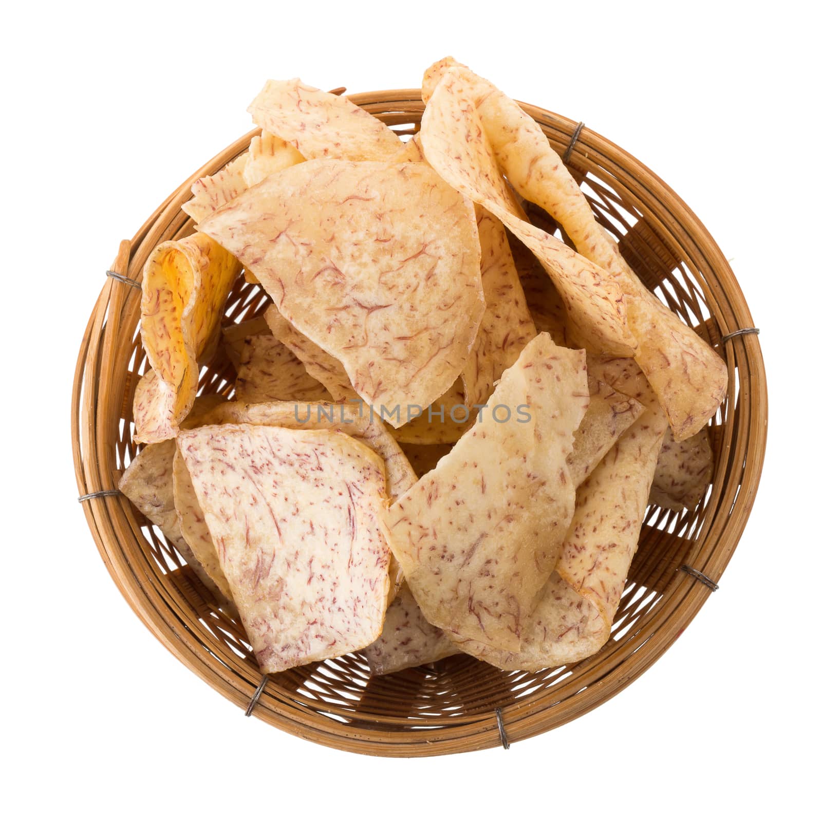 fried Taro slices Dip into the caramel In the basket isolated on white background.