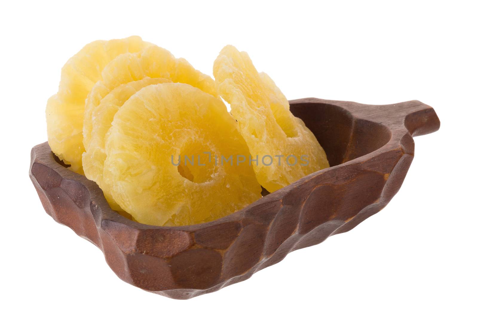 dried ananas slices In the basket, candied pineapple slice isolated on white background.