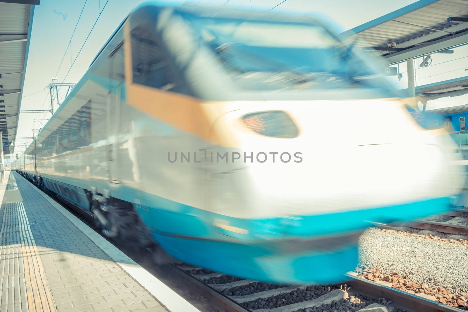 high speed train. international high-speed train leaves the platform at the train station. Fast and convenient train travel