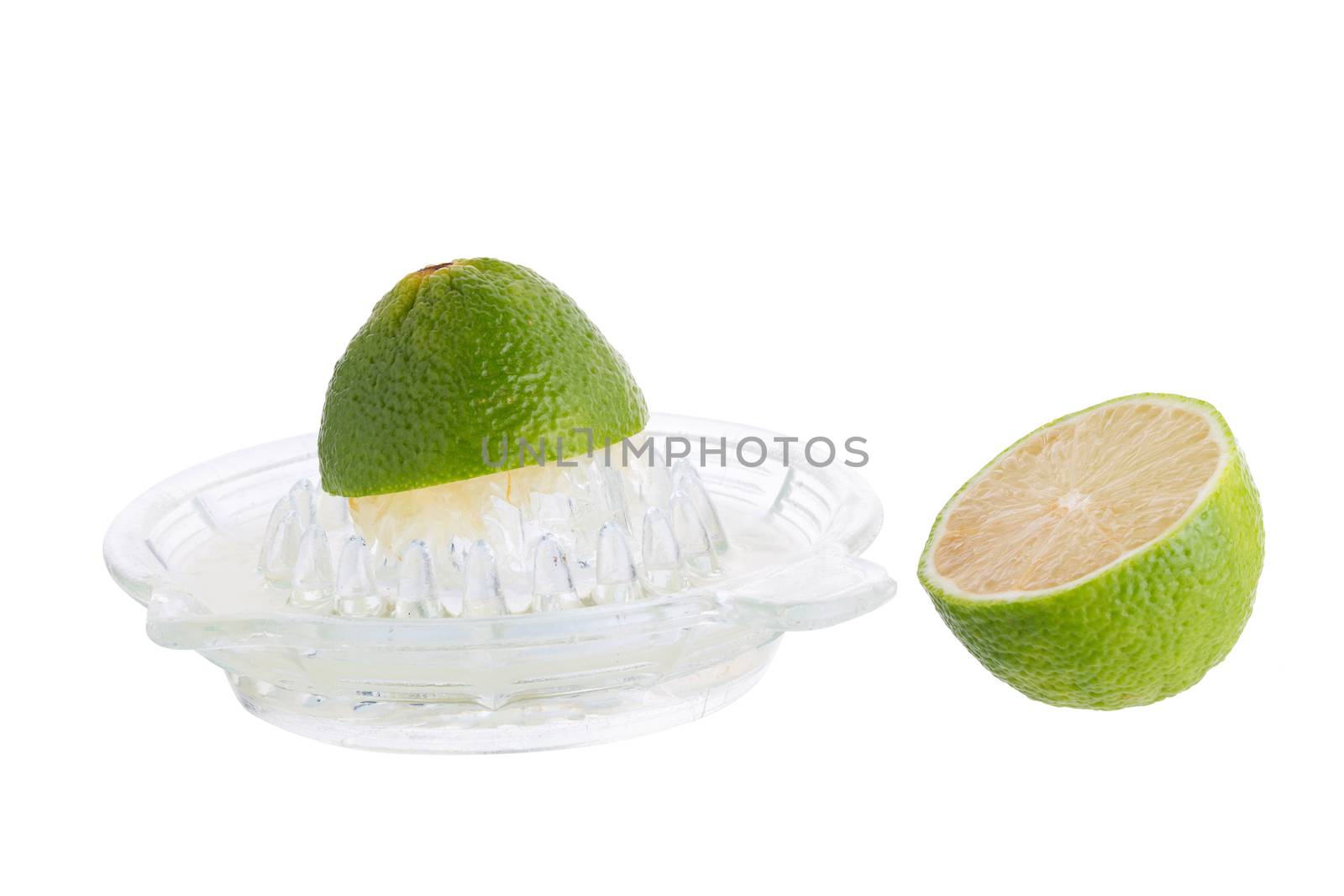 lime crush and lime with half cross section isolated on white ba by kaiskynet