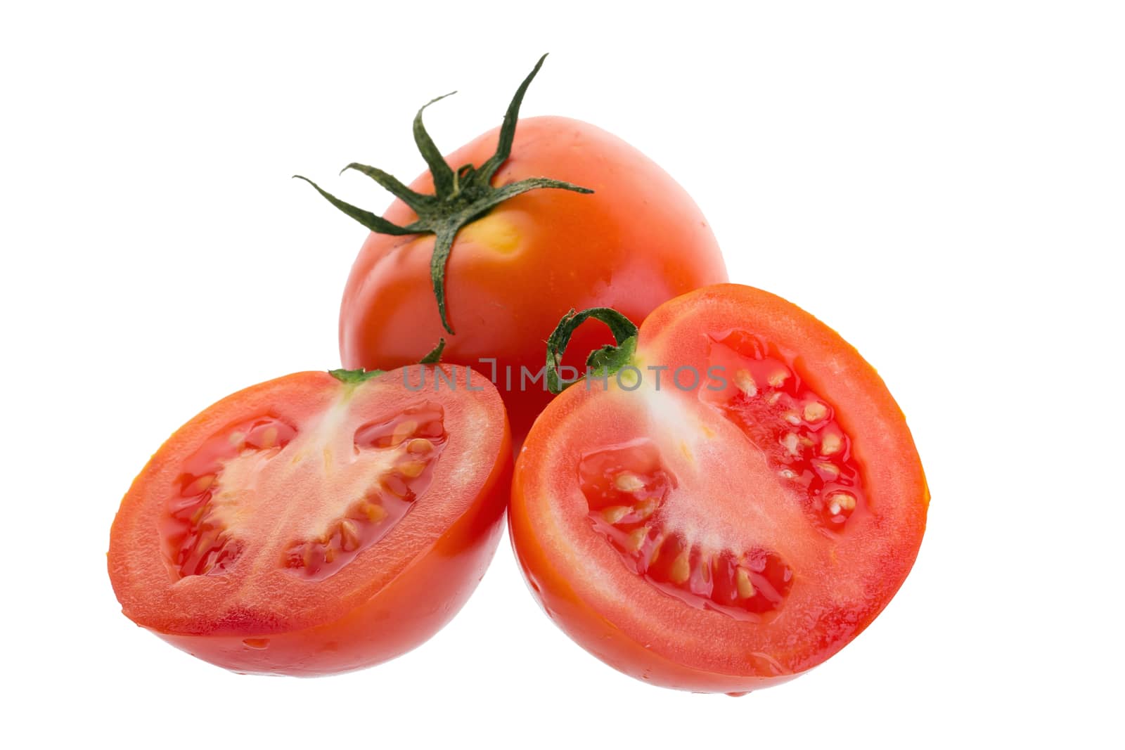 Slice of tomato isolated on a white background by kaiskynet