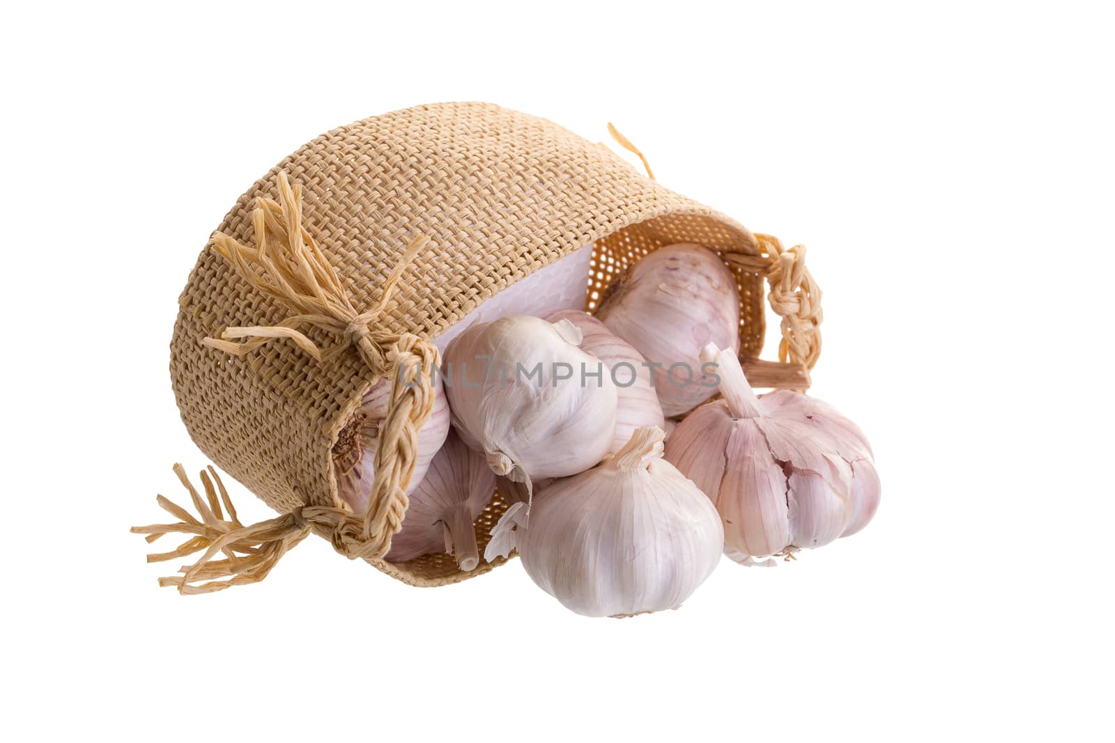 Garlic In the basket isolated on a white background by kaiskynet