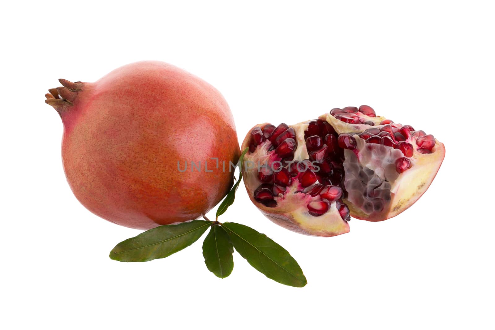 Pomegranate isolated on a white background by kaiskynet