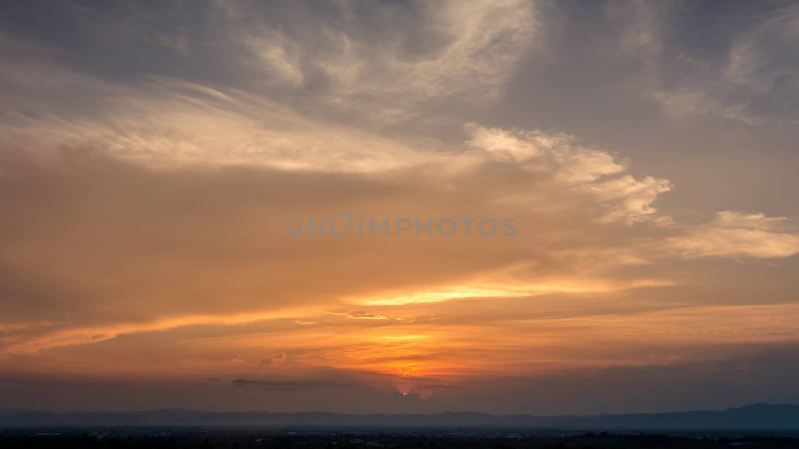 Time Lapse of Colorful dramatic sky with cloud at Sunrise.Sky with sun background