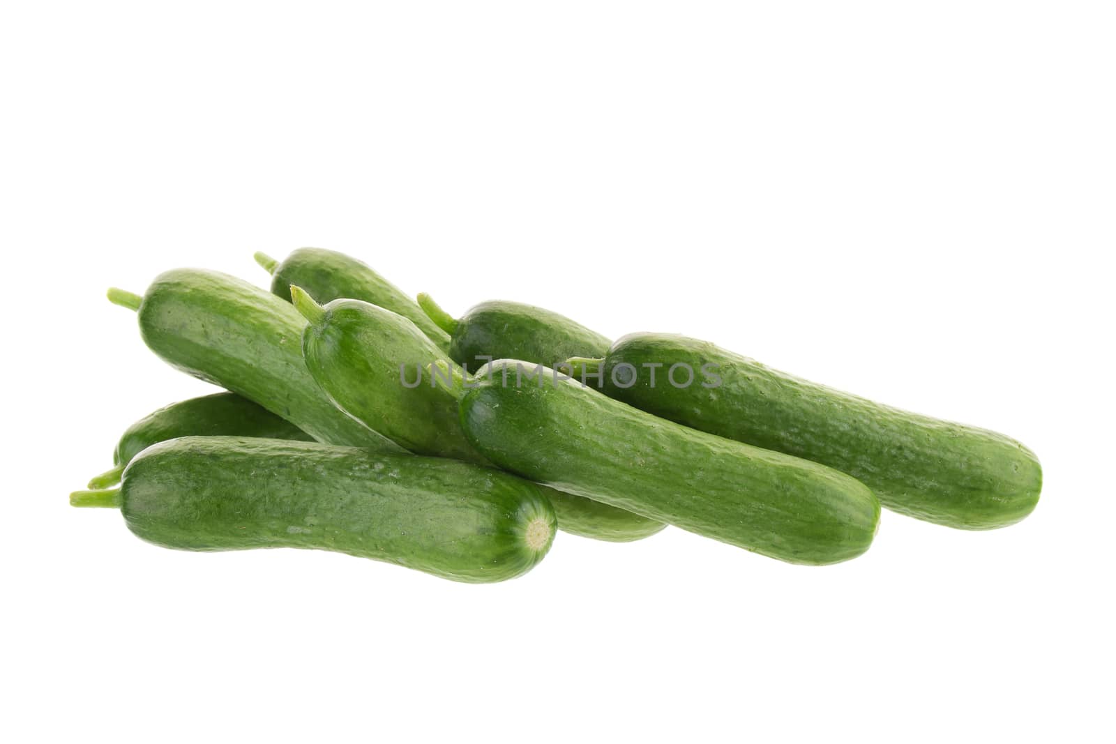 Organic Mini Baby Cucumbers isolated on white background.