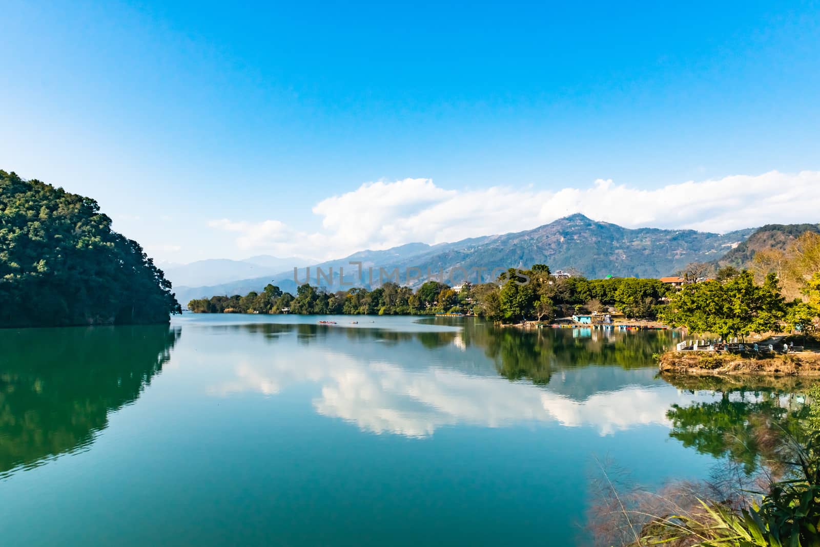 View at Annapurna mountain range in Phewa lake in Pokhara, Nepal by rayints