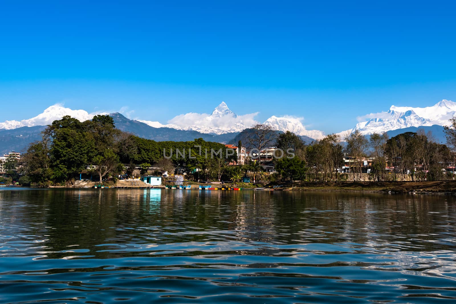 View at Annapurna mountain range in Phewa lake in Pokhara, Nepal by rayints