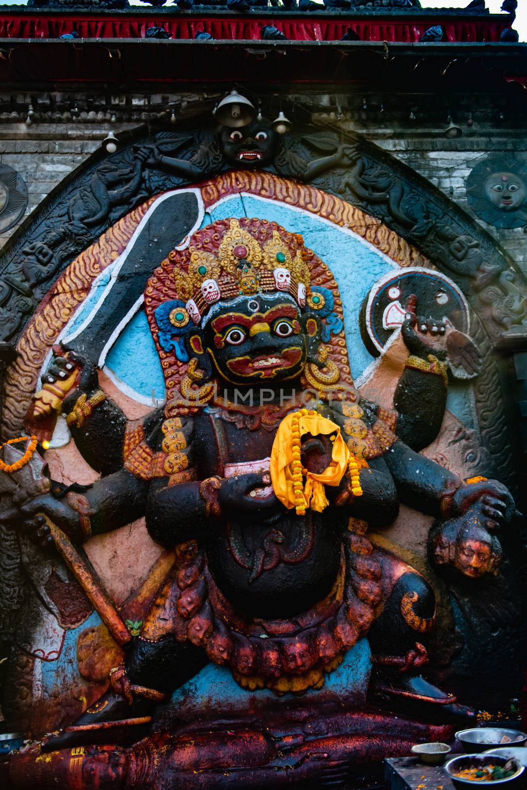 Six Armed Mahakala or Kal Bhairav statue in Durbar Square Kathmandu,Nepal. by rayints