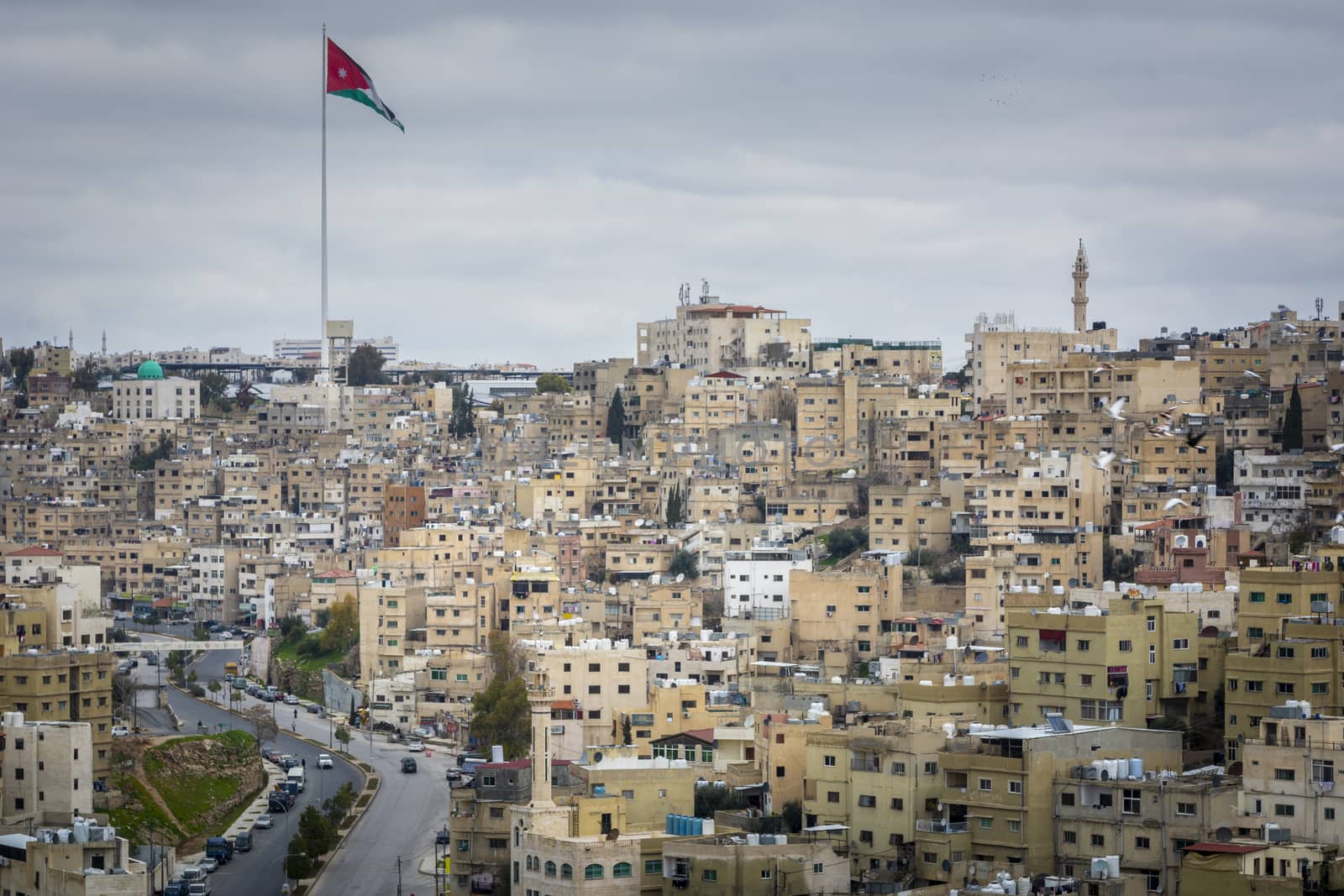 Cityscape and skyline of Amman in Jordan, with view on the Raghadan Flagpole by kb79