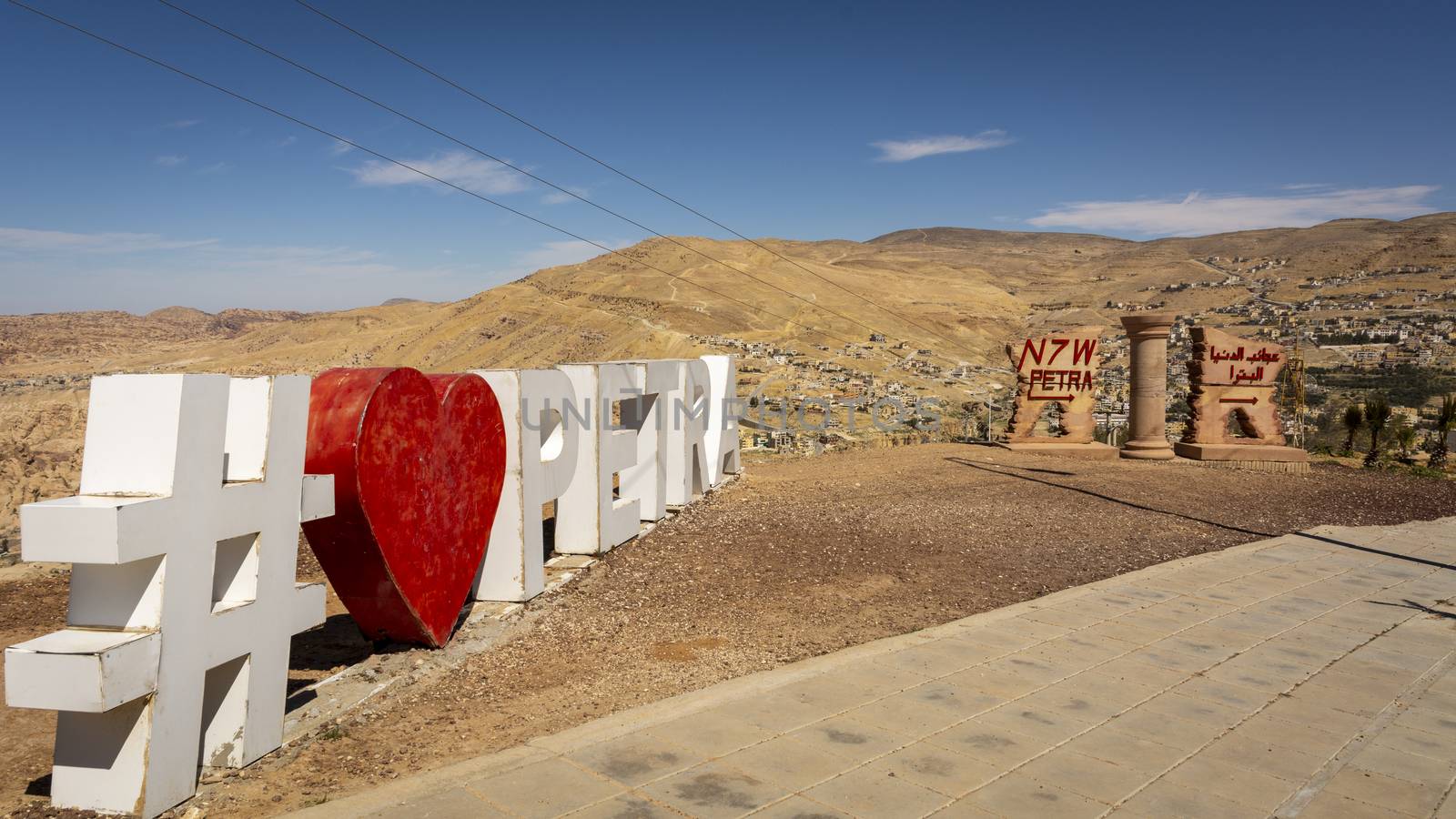 Hashtag road sign in Petra displaying "I Love Petra" when entering the city of Wadi Musa by kb79