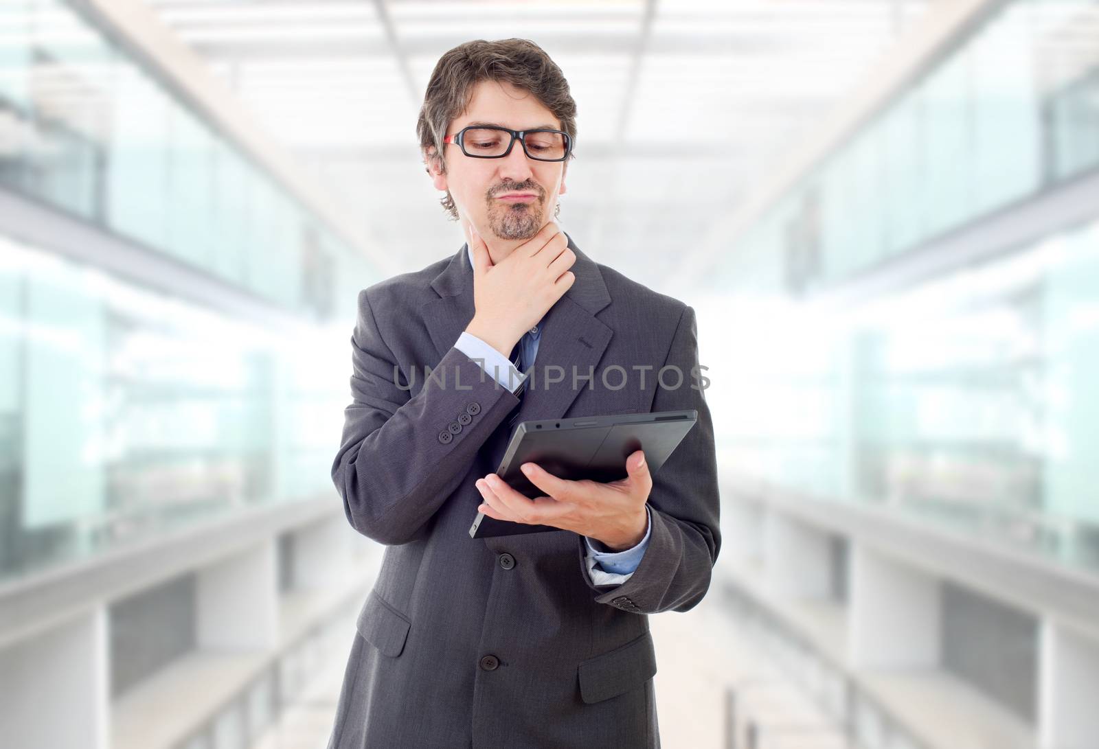 businessman using touch pad of tablet pc, at the office