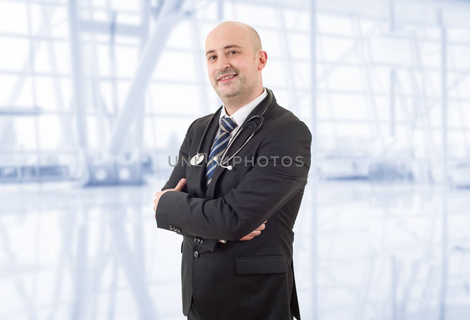 happy male doctor at the hospital