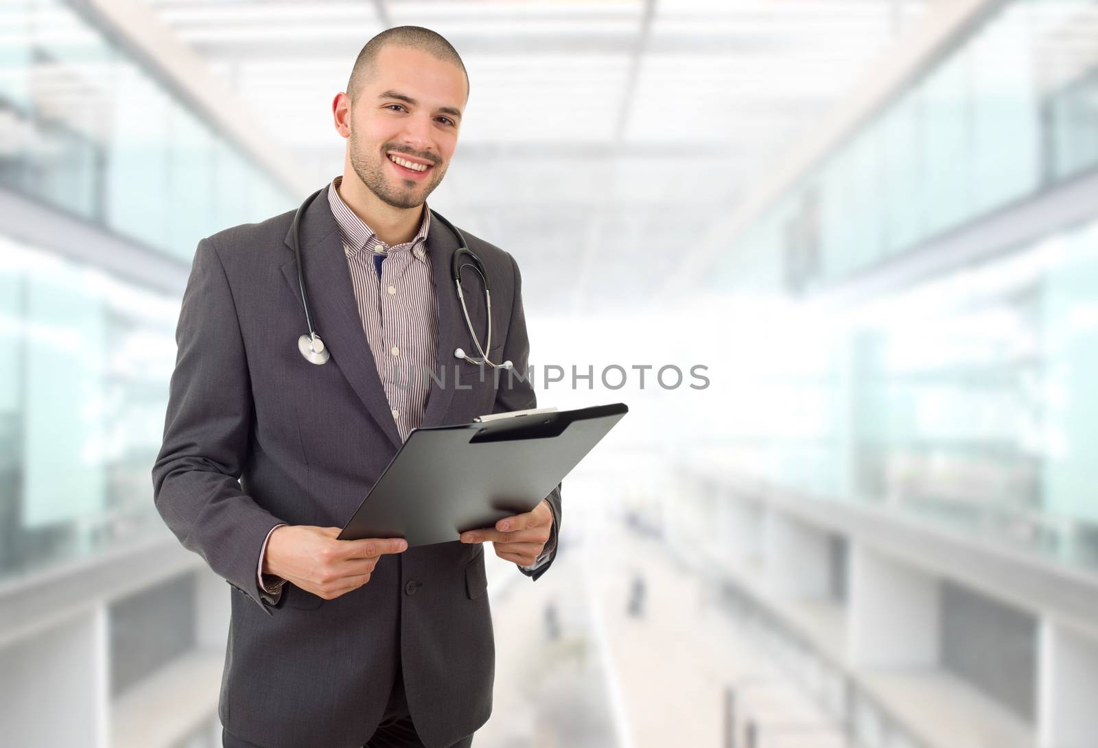 happy male doctor, at the hospital