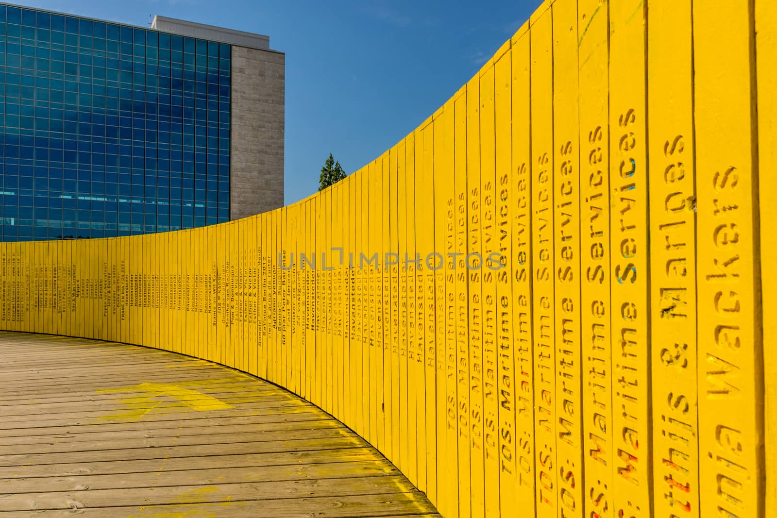 Rotterdam, Netherlands, September 2019: view on the Luchtsingel, a crowdfunded elevated wooden yellow foot bridge, connecting park pompenburg, hofplein and dakakker