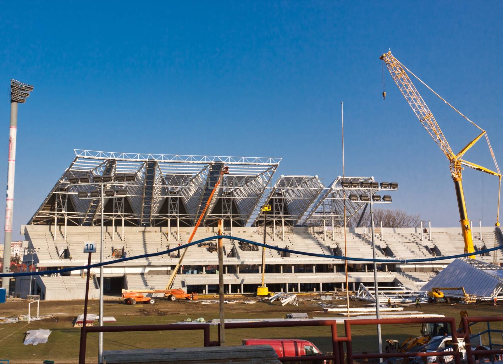 Construction site of football stadium in Rzeszow for  football and speedway championship, visible workers and cranes