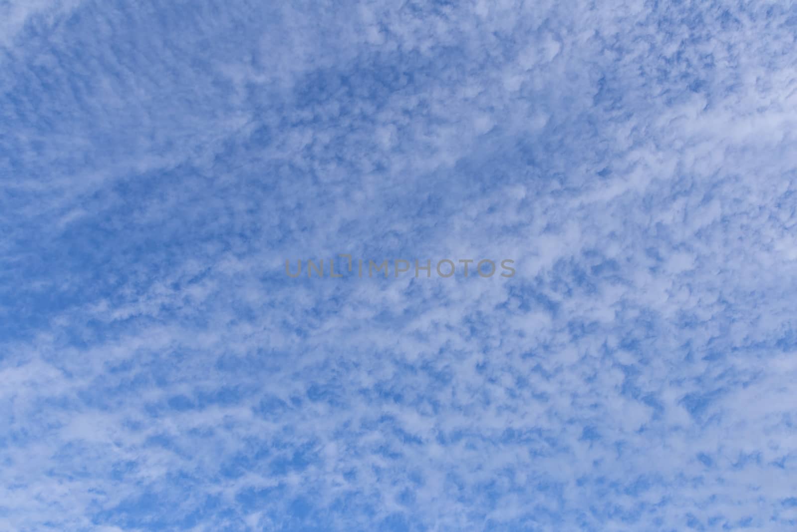 Blue sky background with white clouds on sunny day. by phanthit