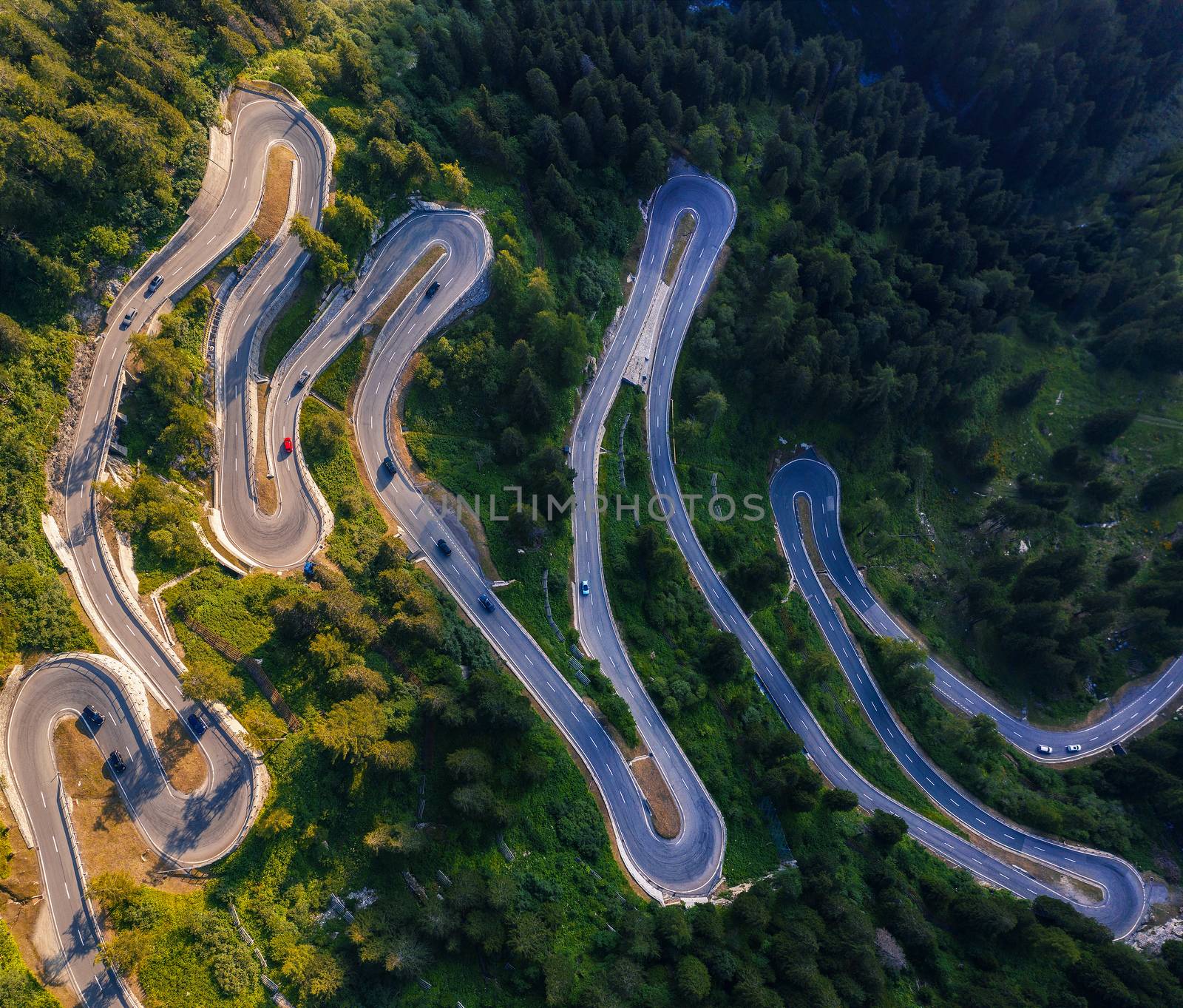Aerial view of Maloja Pass road in Switzerland by nickfox