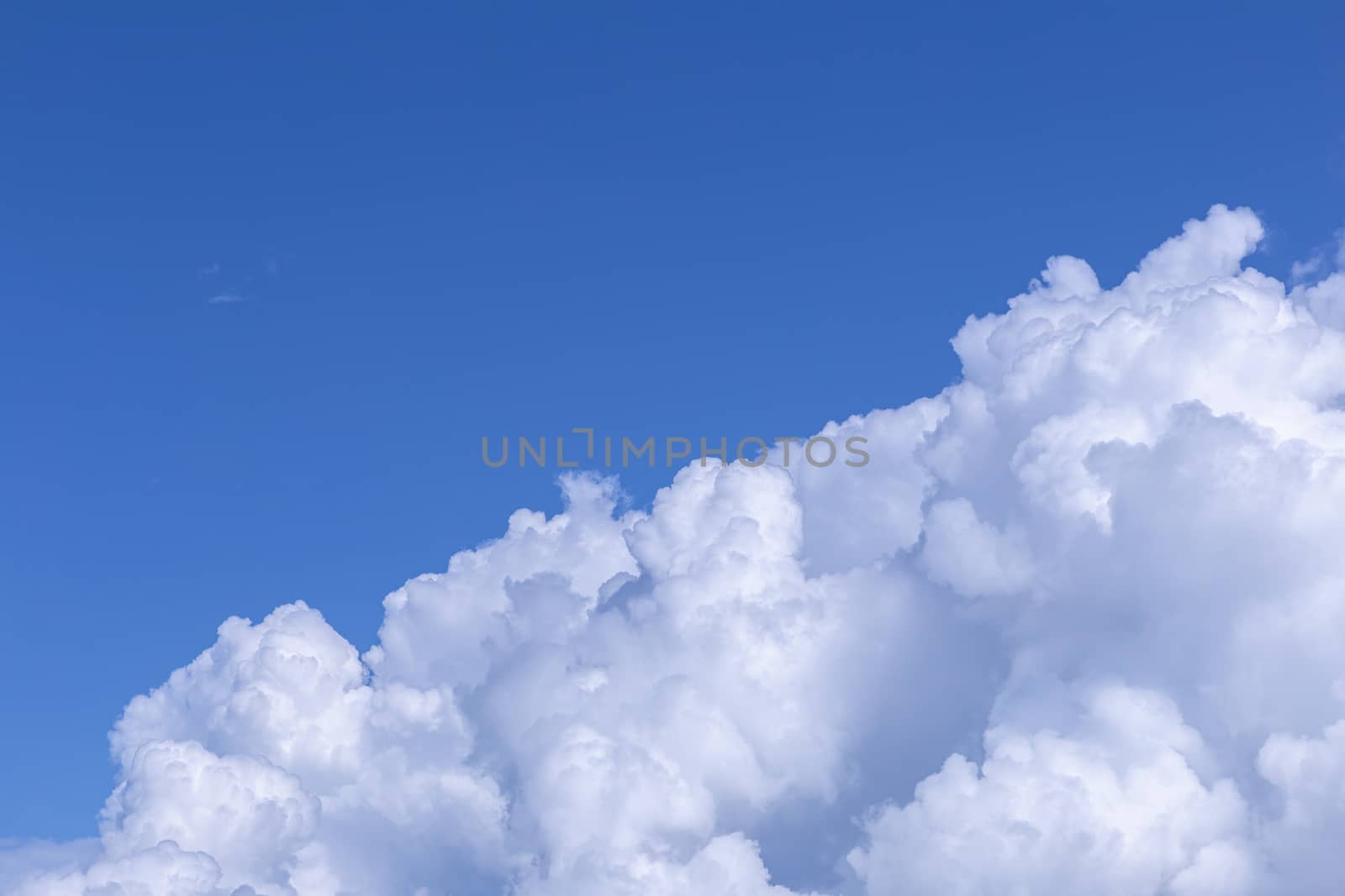Blue sky background with white clouds on sunny day. by phanthit