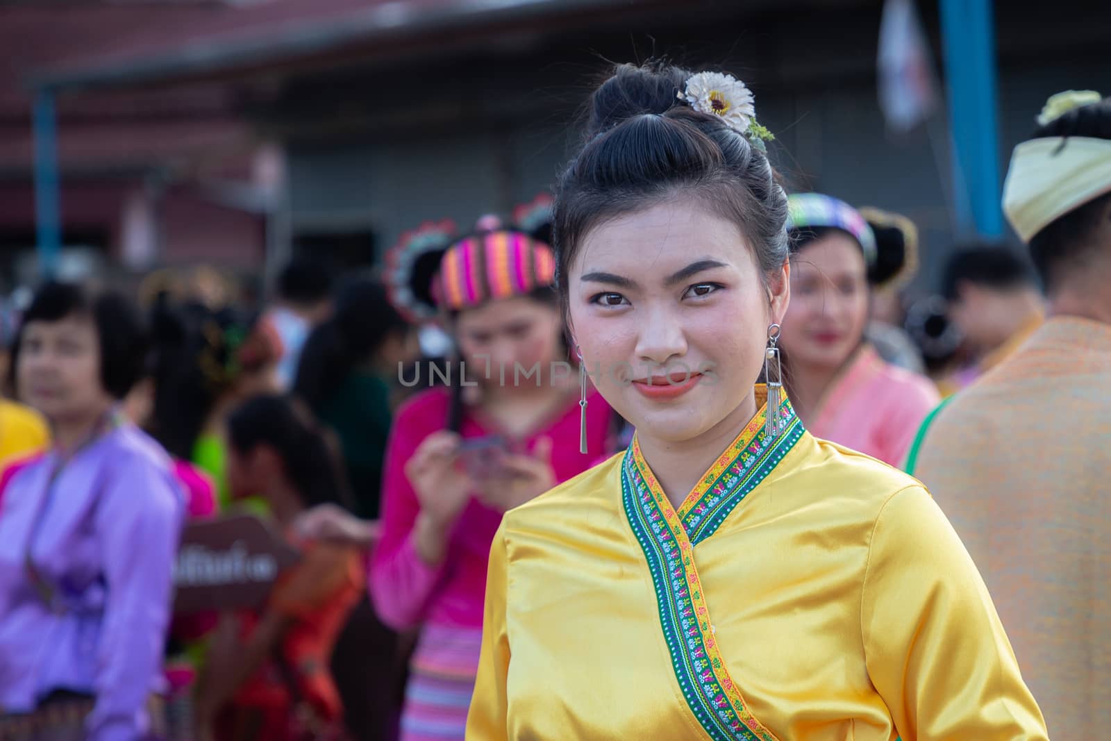 Beauty woman of Shan or Tai Yai (ethnic group living in parts of Myanmar and Thailand) in tribal dress on Shan New Year by phanthit