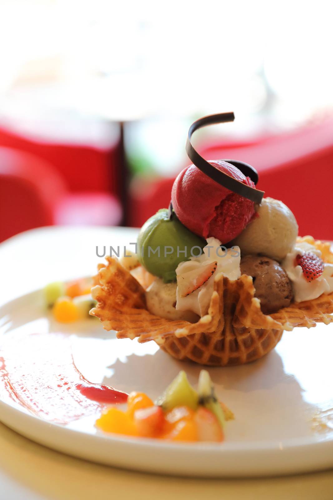 ice cream on waffle and fruit topping